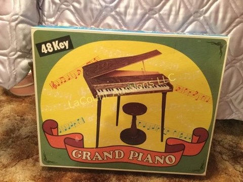 97 Miscellaneous toy baby grand piano.