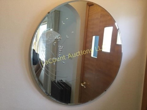 132 Miscellaneous Parrot etched round mirror.