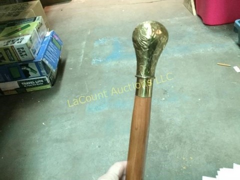260 Miscellaneous Cane or walking stick with brass end.