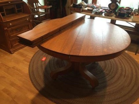 44 Miscellaneous Round pedestal table with 4 leaves 54 inch.