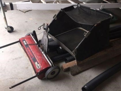 214 Miscellaneous AfriFab 32 inch lawn sweeper.
