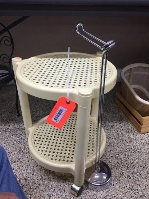 118 Miscellaneous Toilet paper stand & plastic table on wheels.