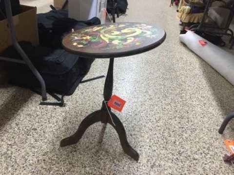 128 Miscellaneous Round tilt top table 15 inch diameter x 22 inches.