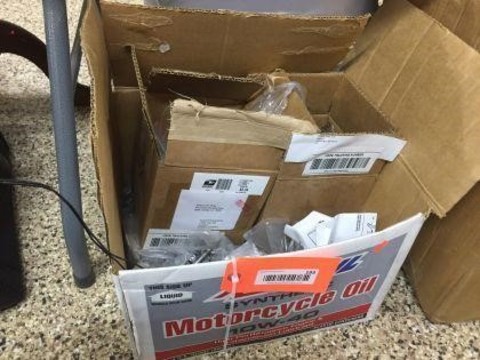 193 Miscellaneous Box of partial motorcycle parts.
