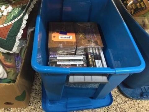 267 Miscellaneous DVD s & container with cover.