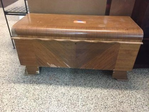 299 Miscellaneous Cedar chest-damage to front 46x18x23.